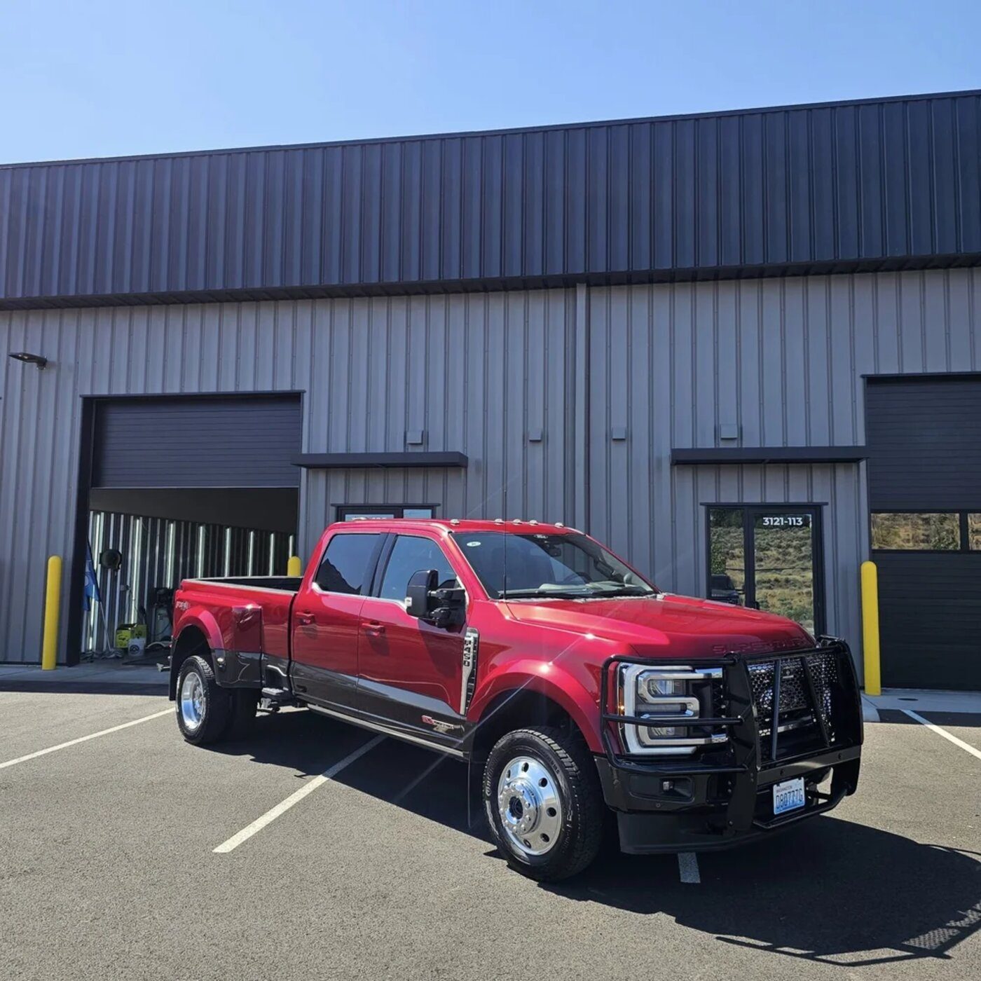 Ceramic-coated Ford Super Duty parked outside the shop