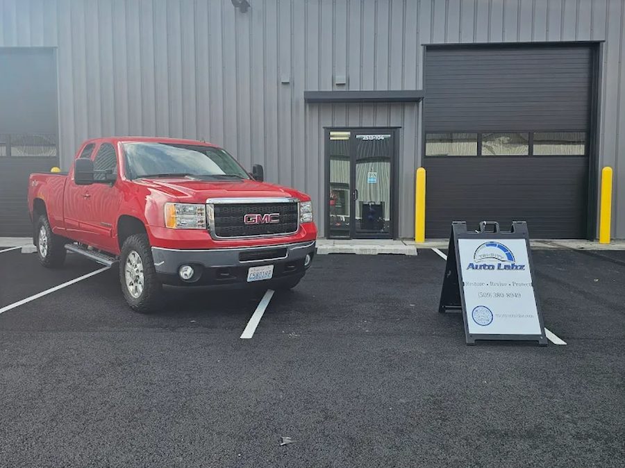 GMC Sierra outside Tri City Auto Labz shop